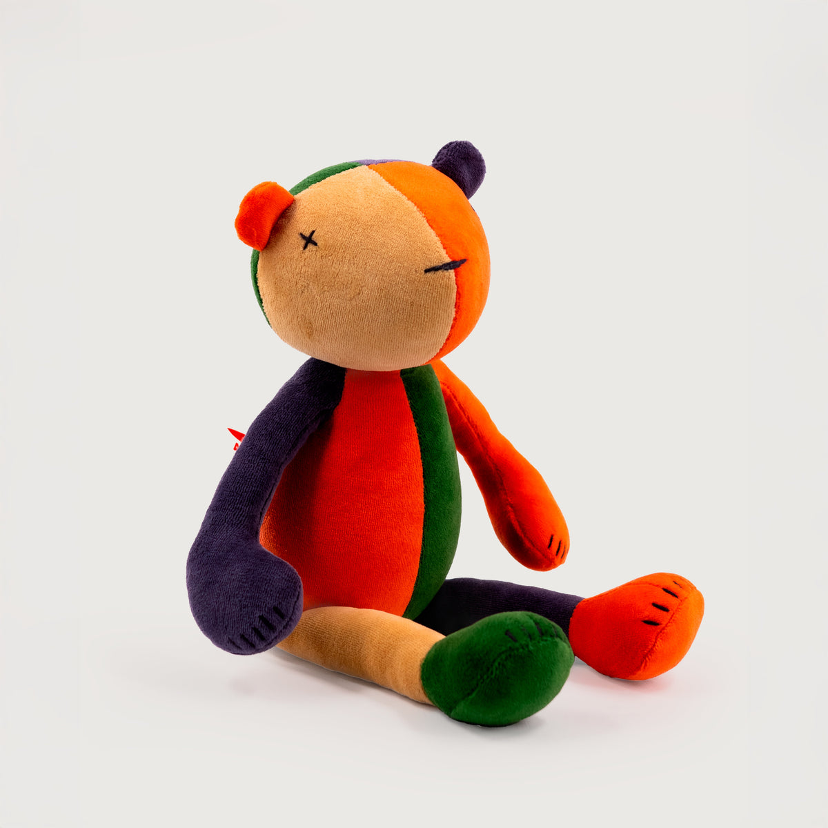 Stuffed teddy bear plush Jermaine, multicolor, sitting pose