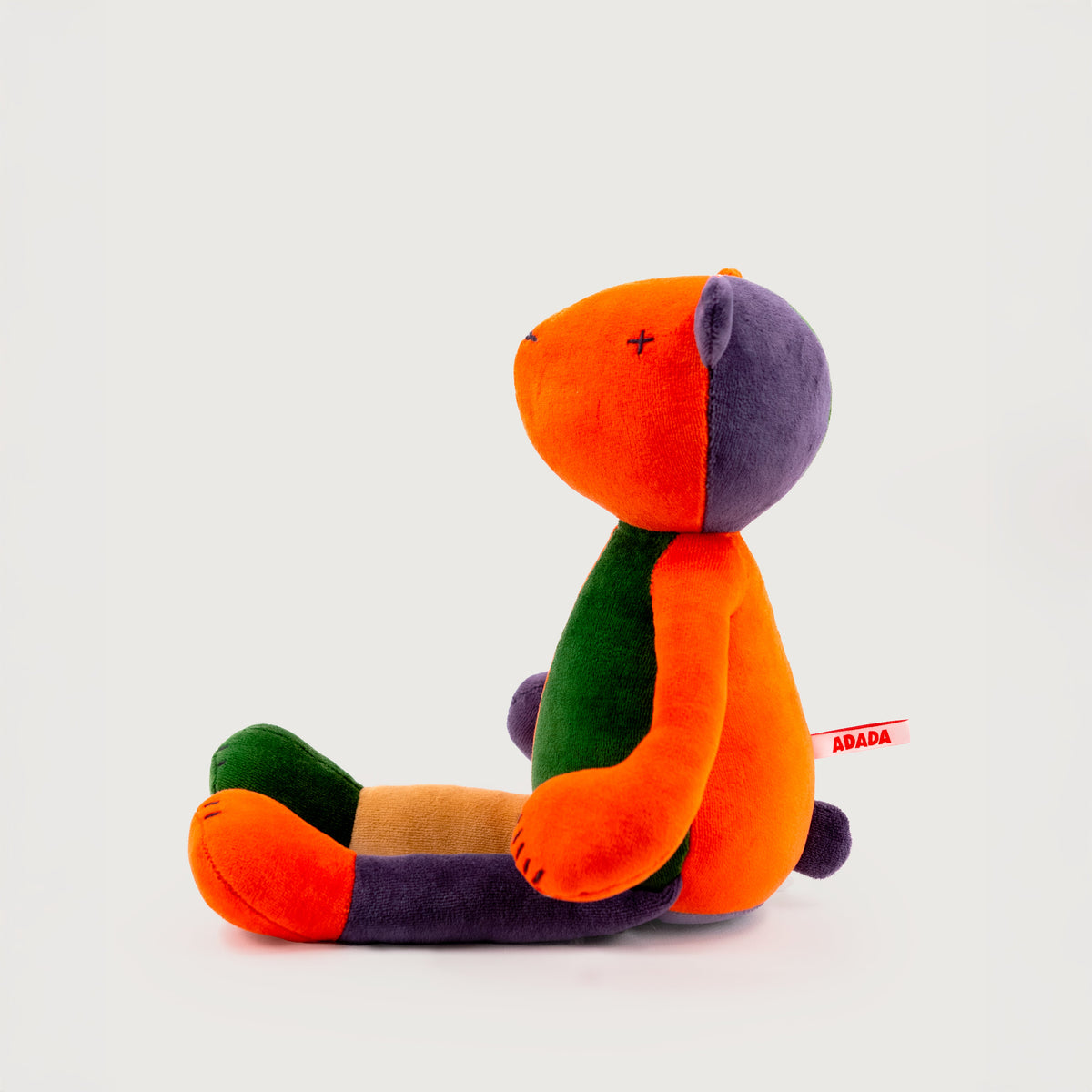 Jermaine the stuffed teddy bear plush, multicolor, alternate sitting view