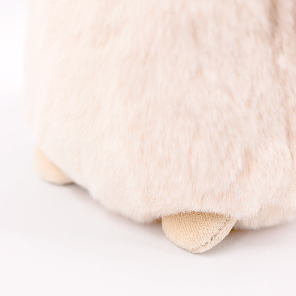 Close-up detail of stuffed penguin plush fabric