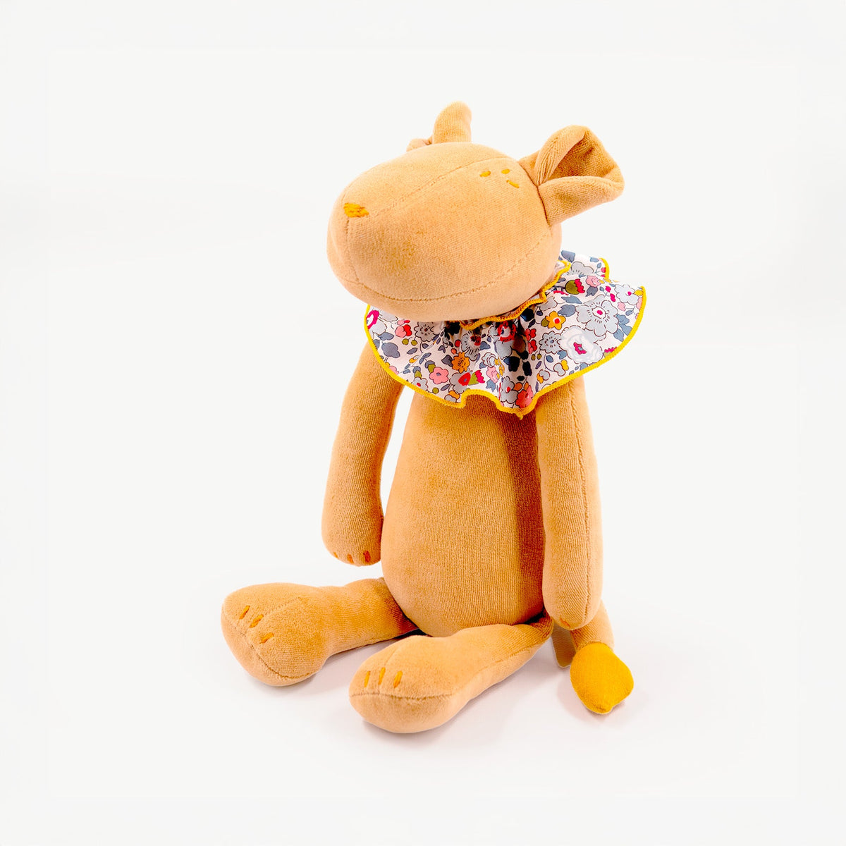 Stuffed lioness plush Emma, sitting three-quarter view