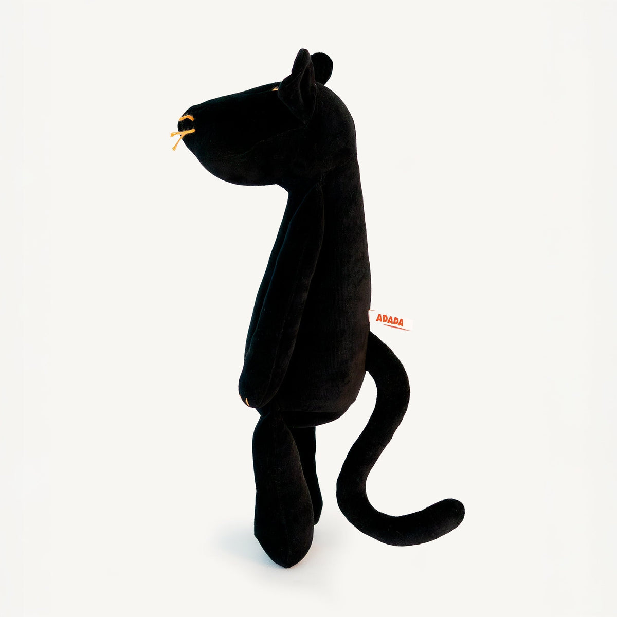 Indira the stuffed panther plush, sitting pose